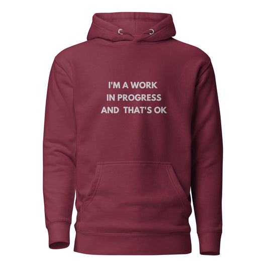 I'm a work in progressand thats ok Embroidered Unisex Hoodie